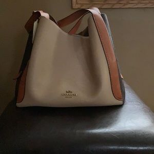 Coach three colored purse-brown, tan, and another shade of tan.